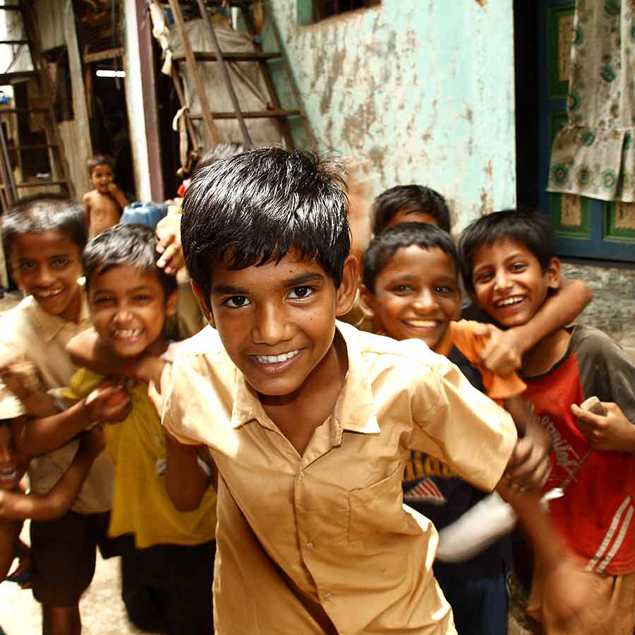 Crowd of smiling boys in Mumbai